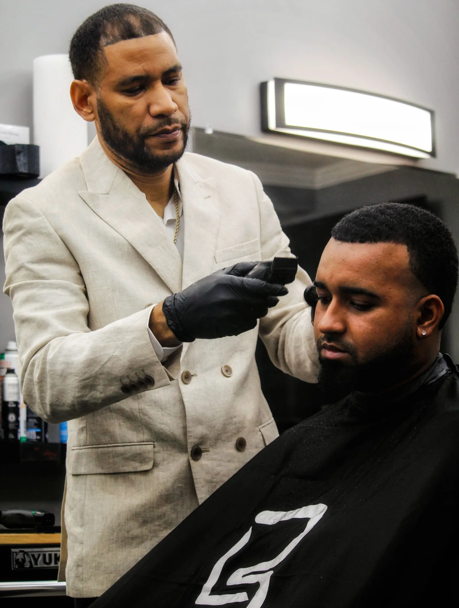 Barbershop no-show prevention workflow with AI reminders and deposits